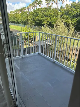 a view of a balcony with outdoor space