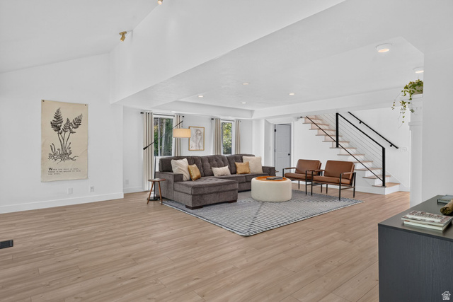1979 Cave Hollow Way Bountiful, UT 84010 - Photo 9 of 59 Open-concept living space featuring light wood-finish flooring, white walls, and recessed lighting