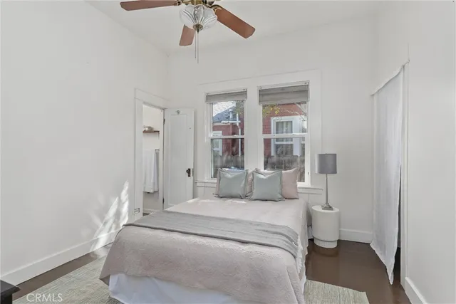 a view of a house with yard and sitting area