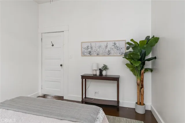 a view of a fire pit with large trees