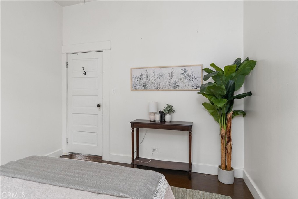 1805 Hemlock Street Chico, CA 95928 - Photo 31 of 62 a bedroom with a bed and a potted plant