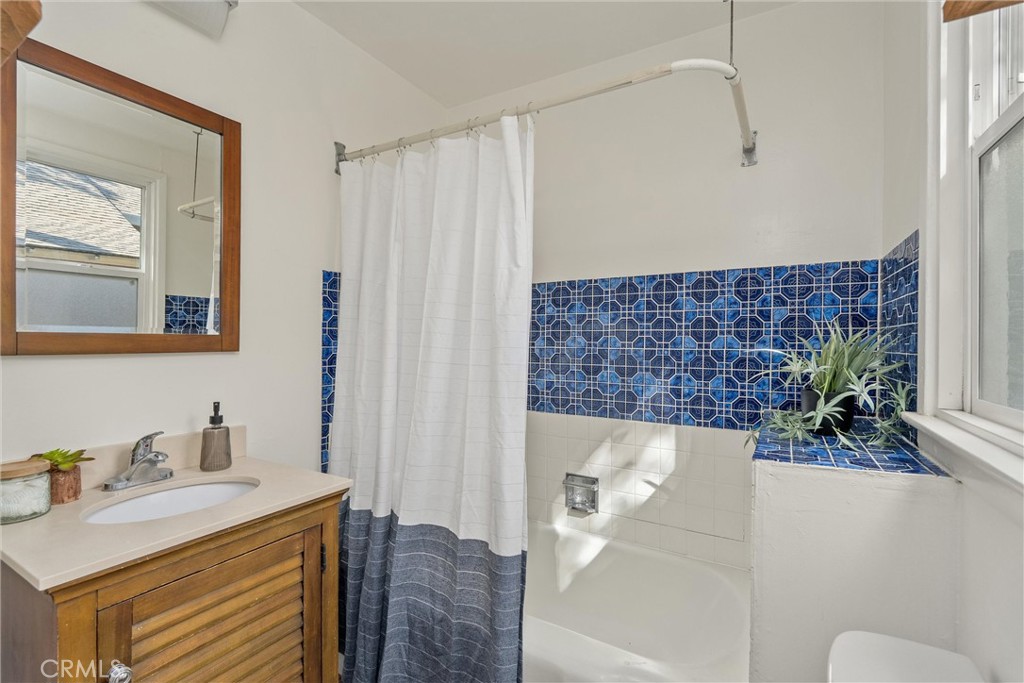 1805 Hemlock Street Chico, CA 95928 - Photo 32 of 62 a bathroom with a sink and a mirror