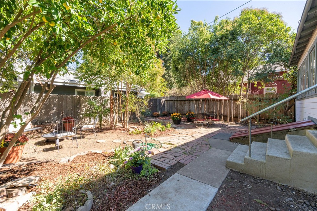 1805 Hemlock Street Chico, CA 95928 - Photo 36 of 62 a view of a backyard with sitting area