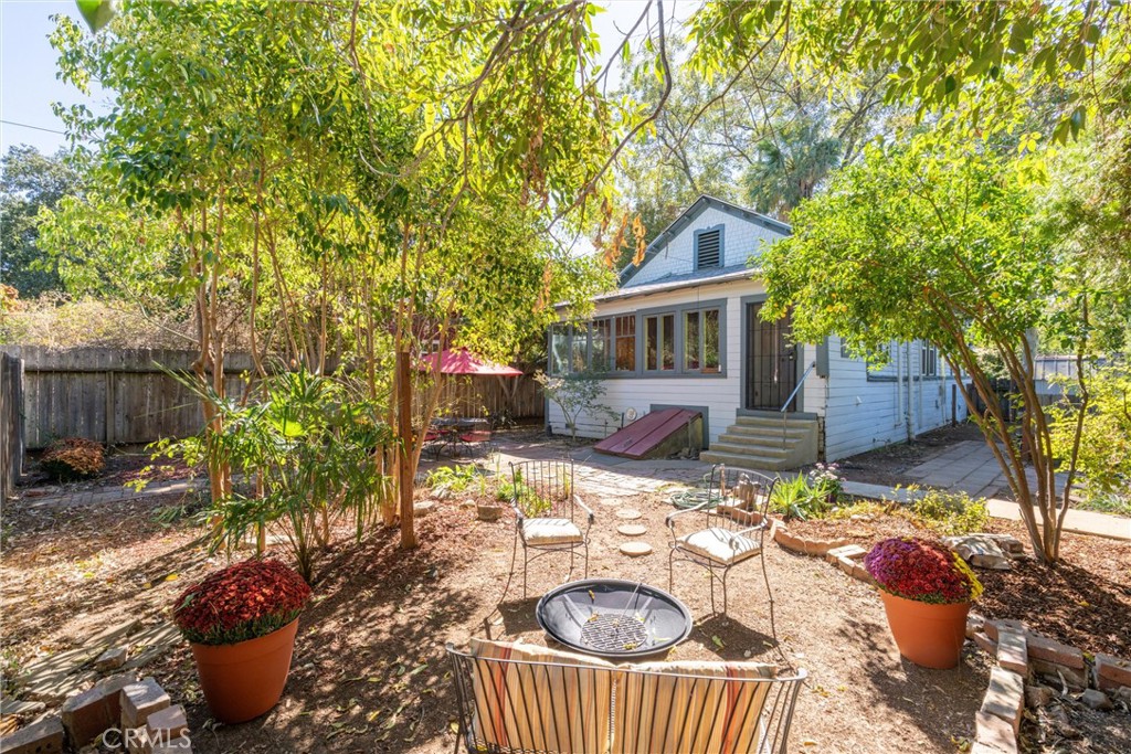 1805 Hemlock Street Chico, CA 95928 - Photo 4 of 62 a backyard of a house with seating space