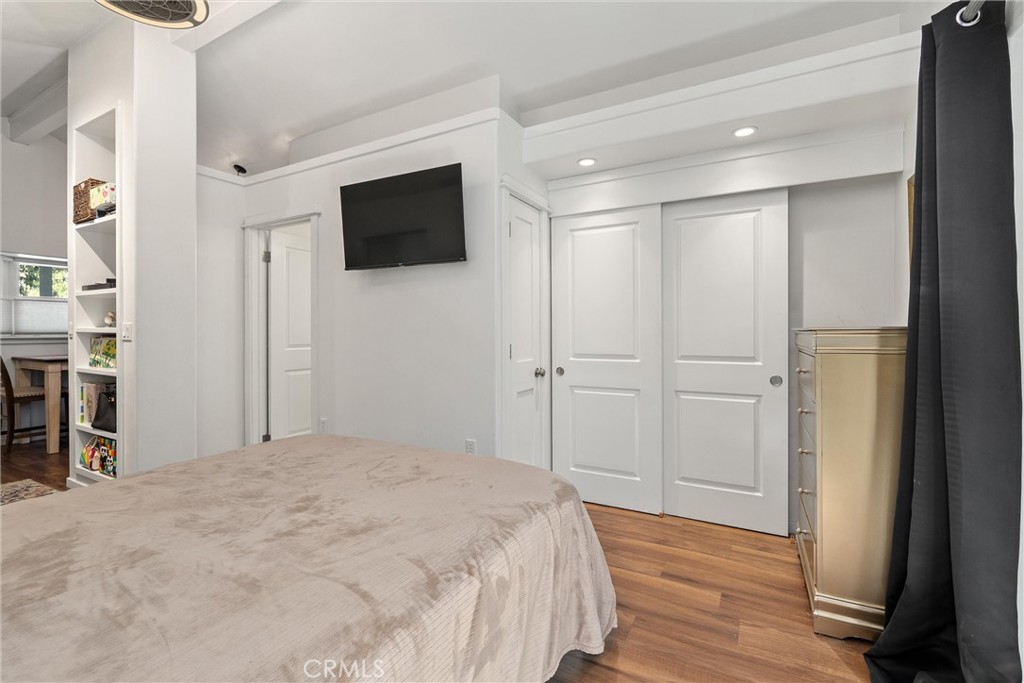 1805 Hemlock Street Chico, CA 95928 - Photo 54 of 62 a bedroom with a bed and a flat screen tv