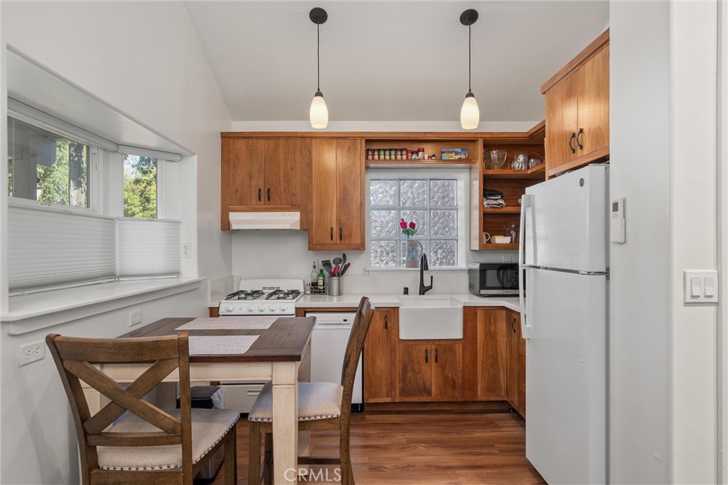 1805 Hemlock Street Chico, CA 95928 - Photo 7 of 62 a kitchen with refrigerator and window