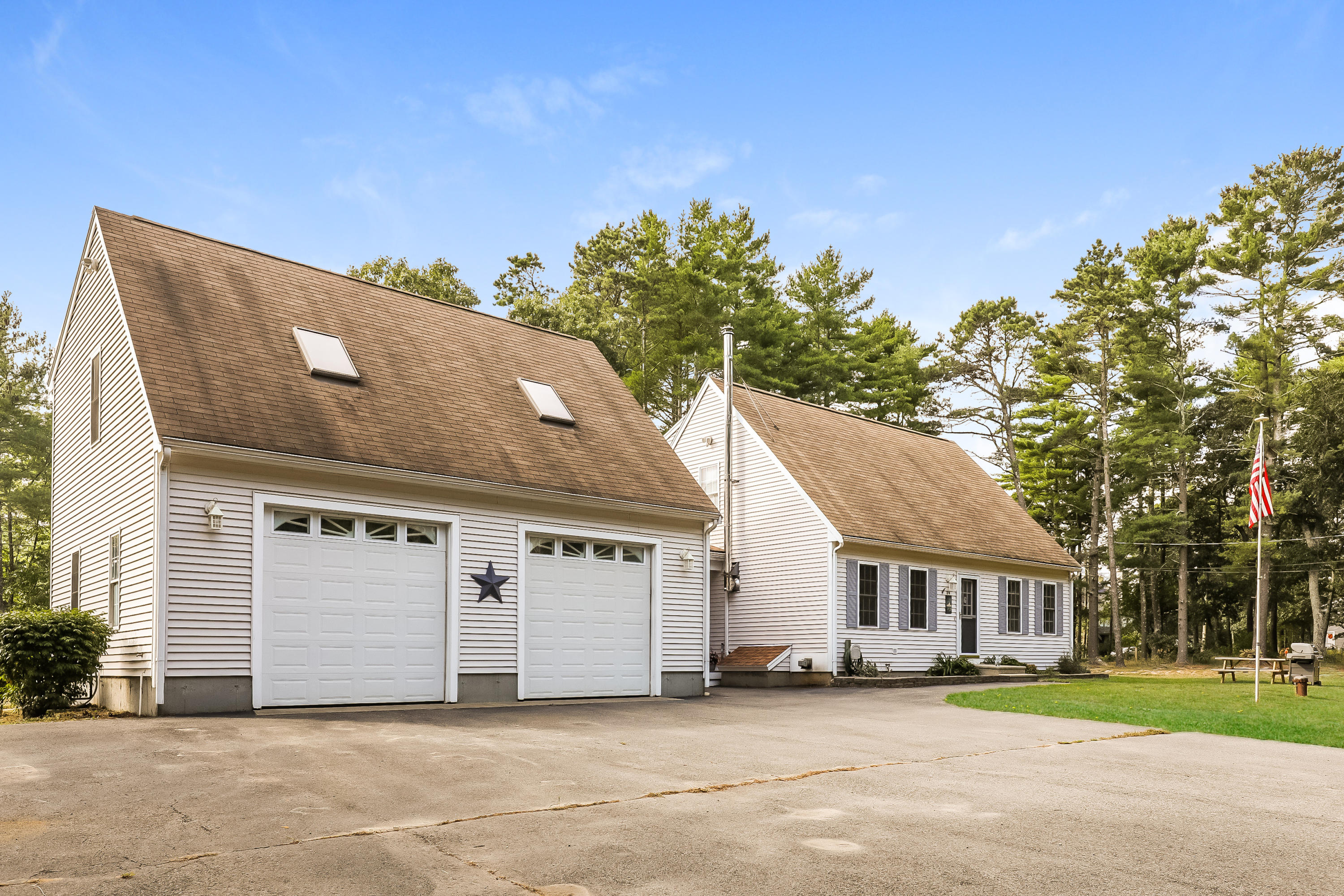 39 Station Street Wareham, MA 02571 - Photo 1 of 22 a front view of a house with a yard