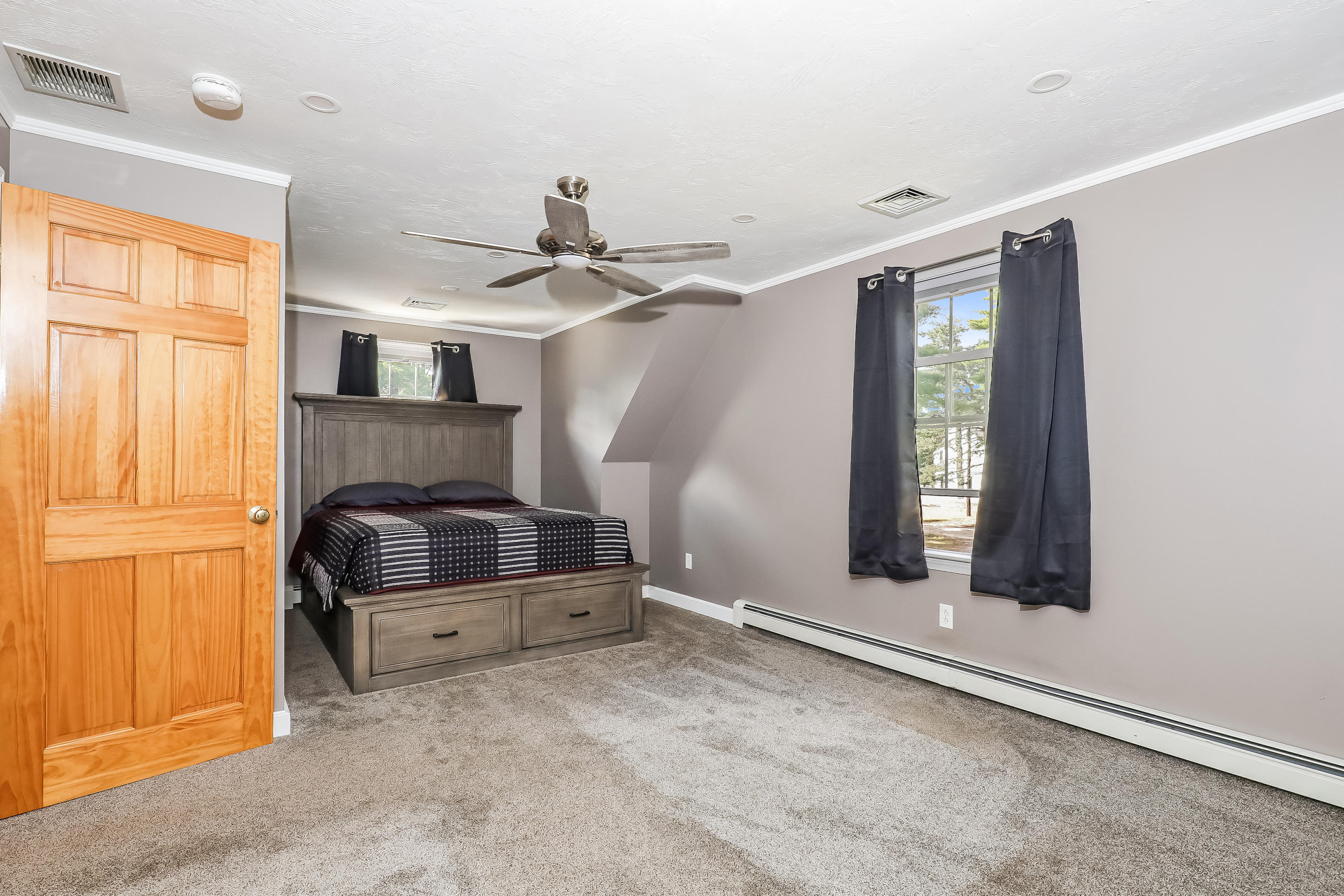 39 Station Street Wareham, MA 02571 - Photo 12 of 22 a living room with a fireplace furniture and a window