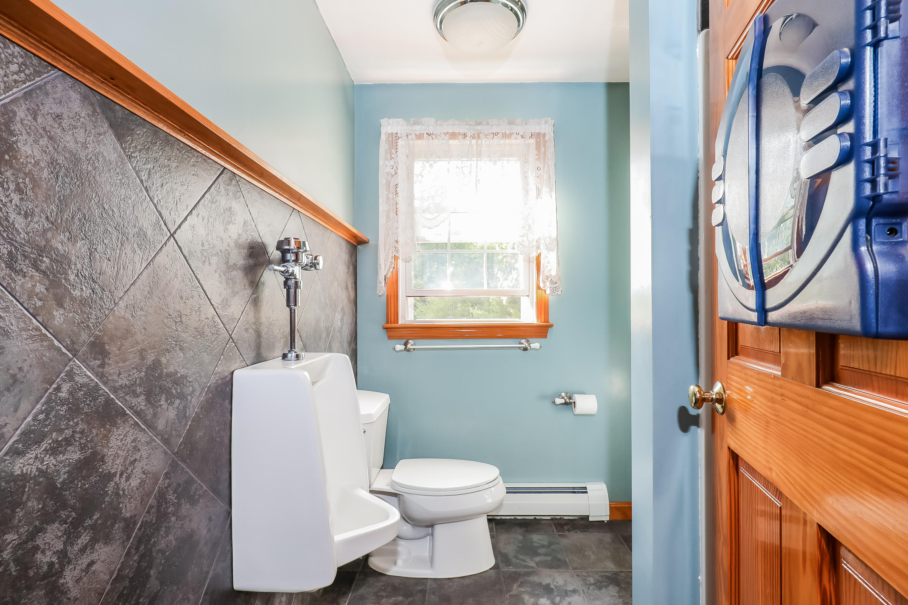 39 Station Street Wareham, MA 02571 - Photo 16 of 22 a bathroom with a toilet sink and mirror
