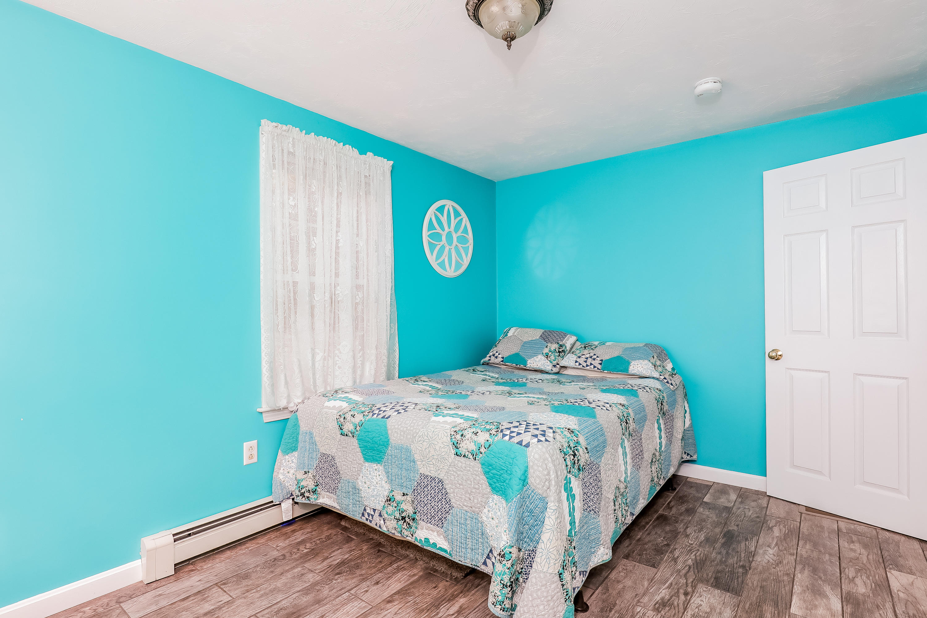 39 Station Street Wareham, MA 02571 - Photo 5 of 22 a bedroom with a bed and a window