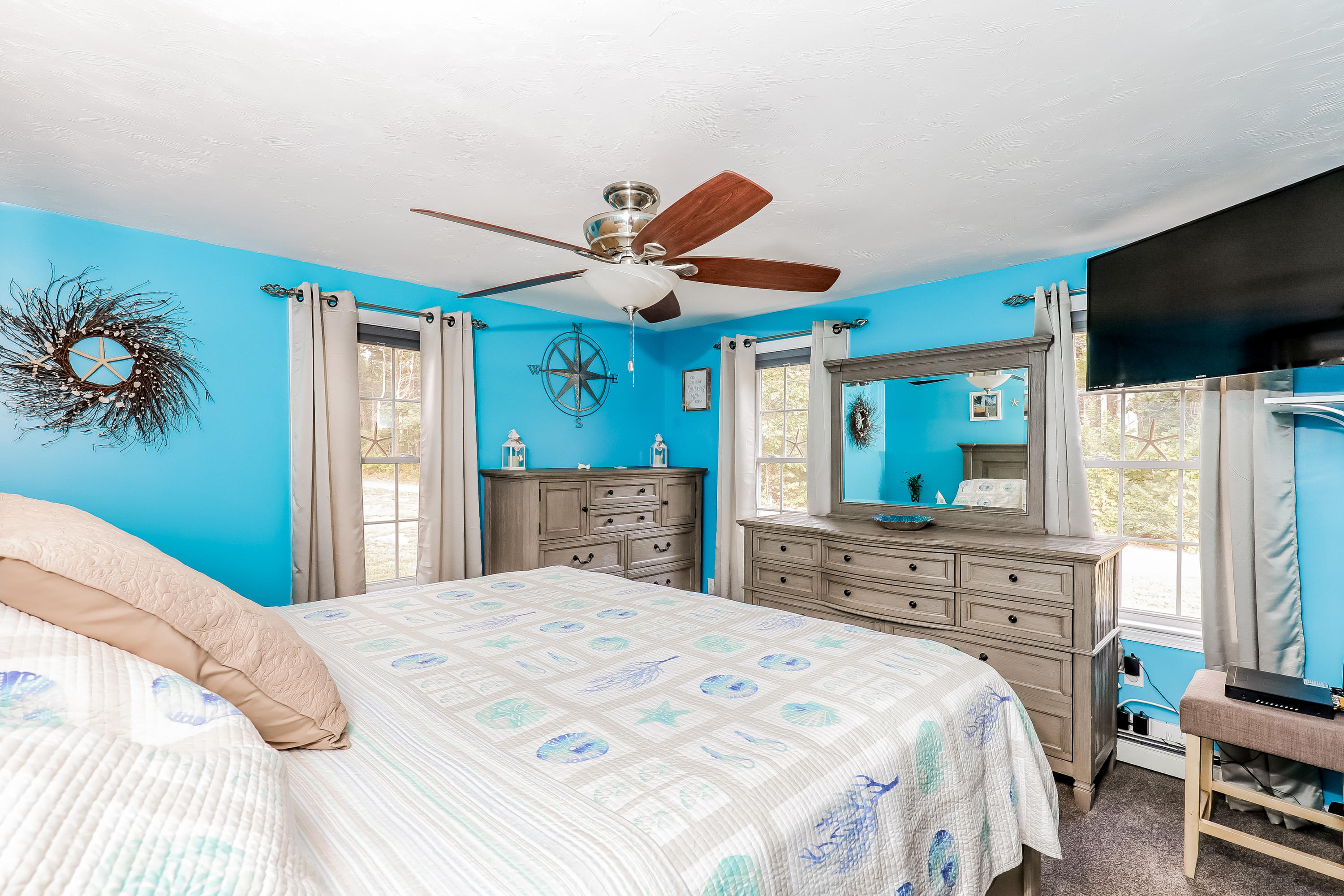 39 Station Street Wareham, MA 02571 - Photo 7 of 22 a bedroom with a bed and a flat screen tv