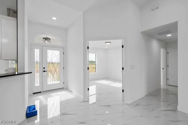 a bathroom with a tub and shower