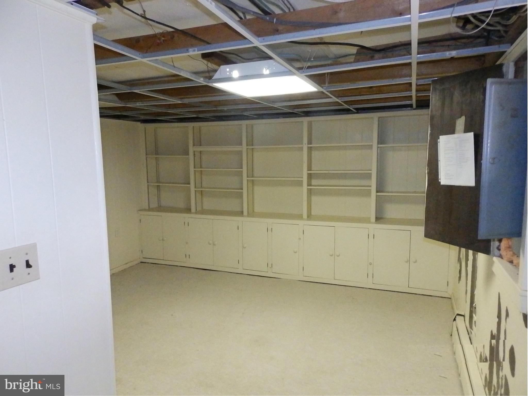 426 Mckinstrys Mill Road Union Bridge, MD 21791 - Photo 24 of 30 Room in basement with shelving and storage