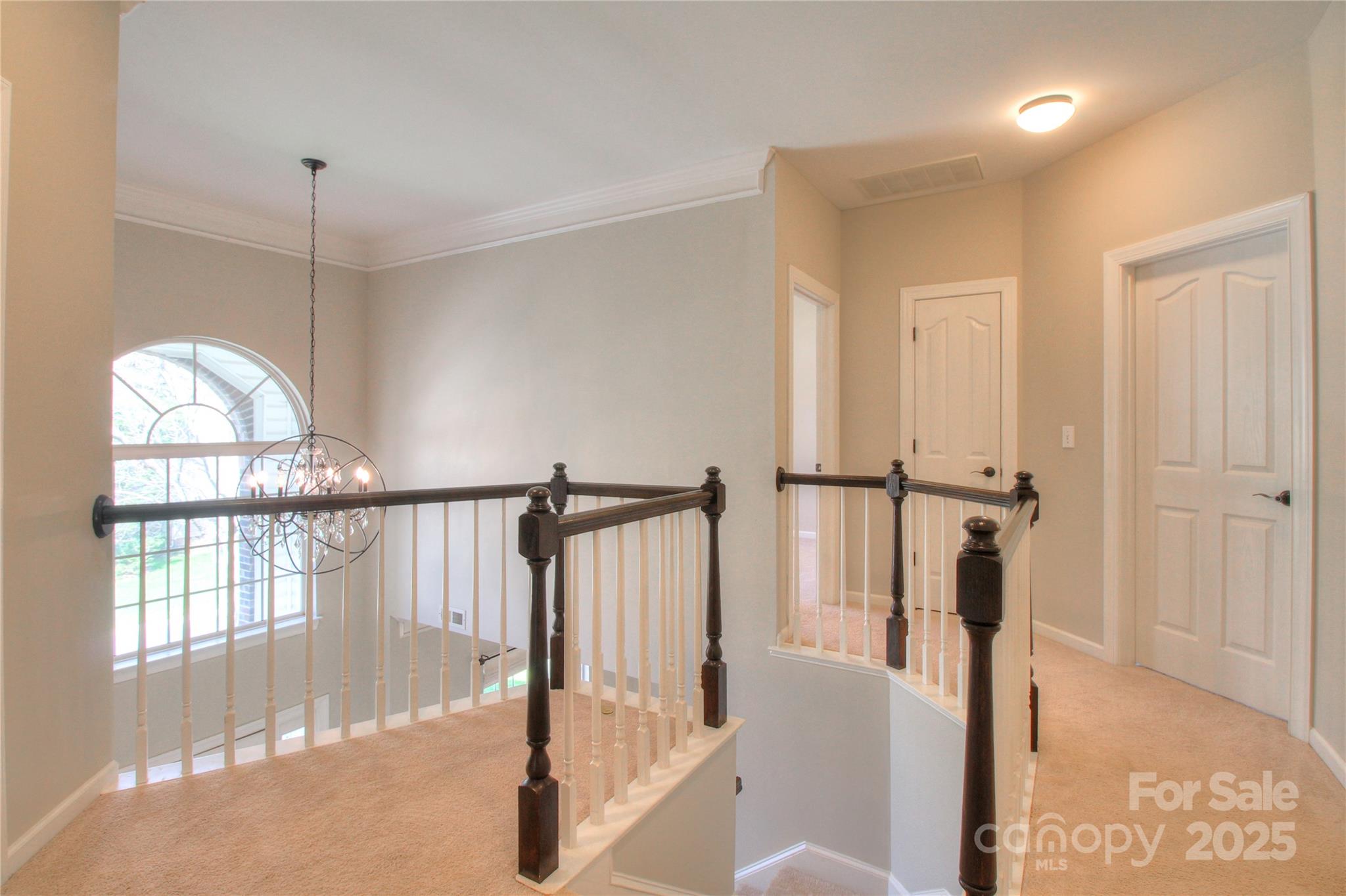 8414 Bampton Drive Concord, NC 28027 - Photo 15 of 32 a view of entryway and hall with wooden floor