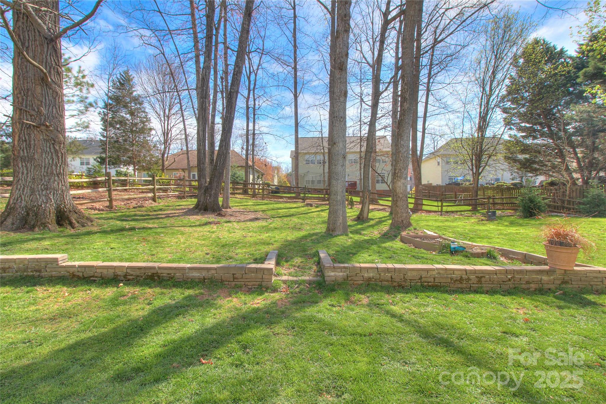 8414 Bampton Drive Concord, NC 28027 - Photo 27 of 32 a view of a park with large trees