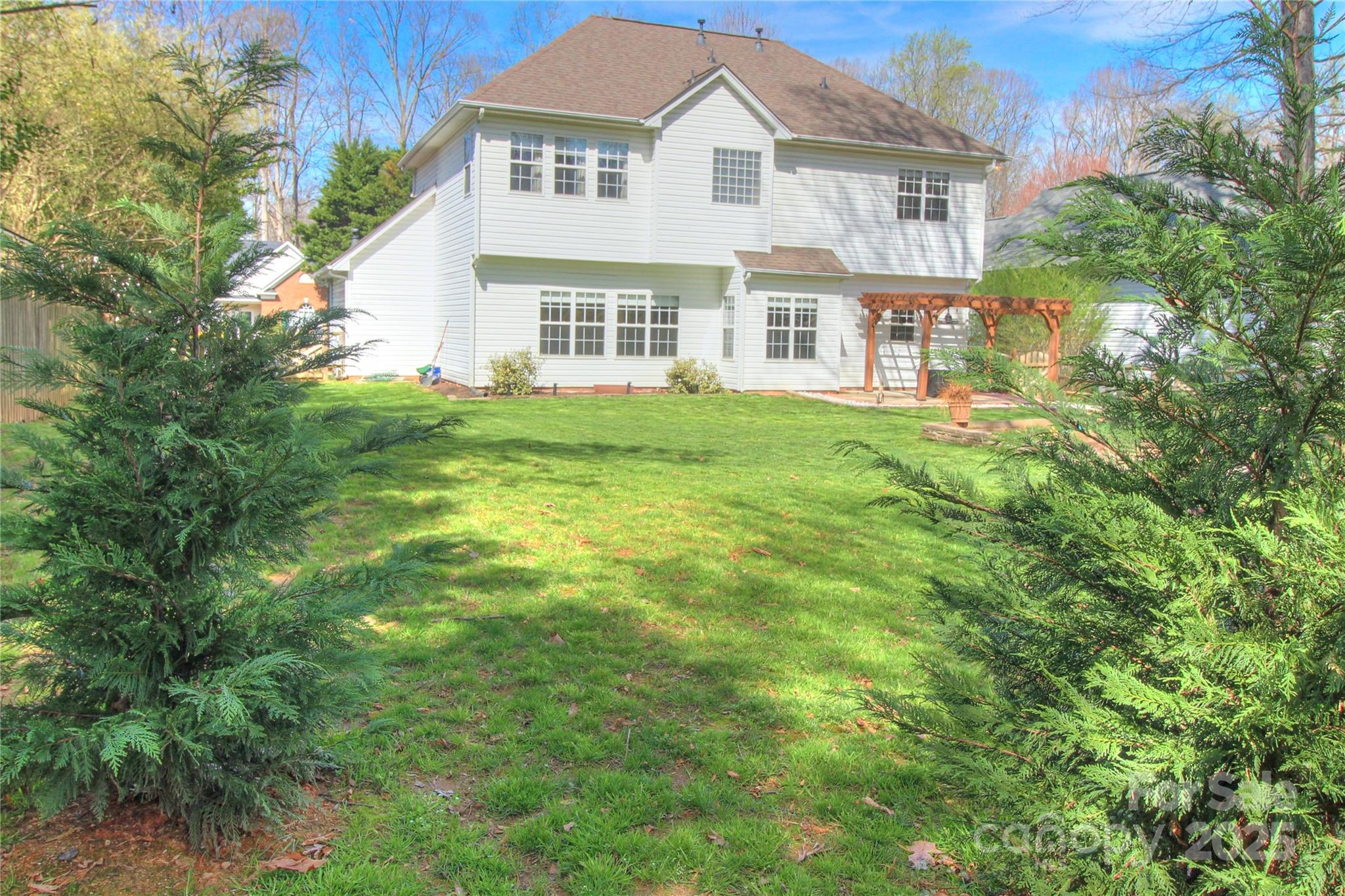 8414 Bampton Drive Concord, NC 28027 - Photo 30 of 32 a front view of a house with a yard