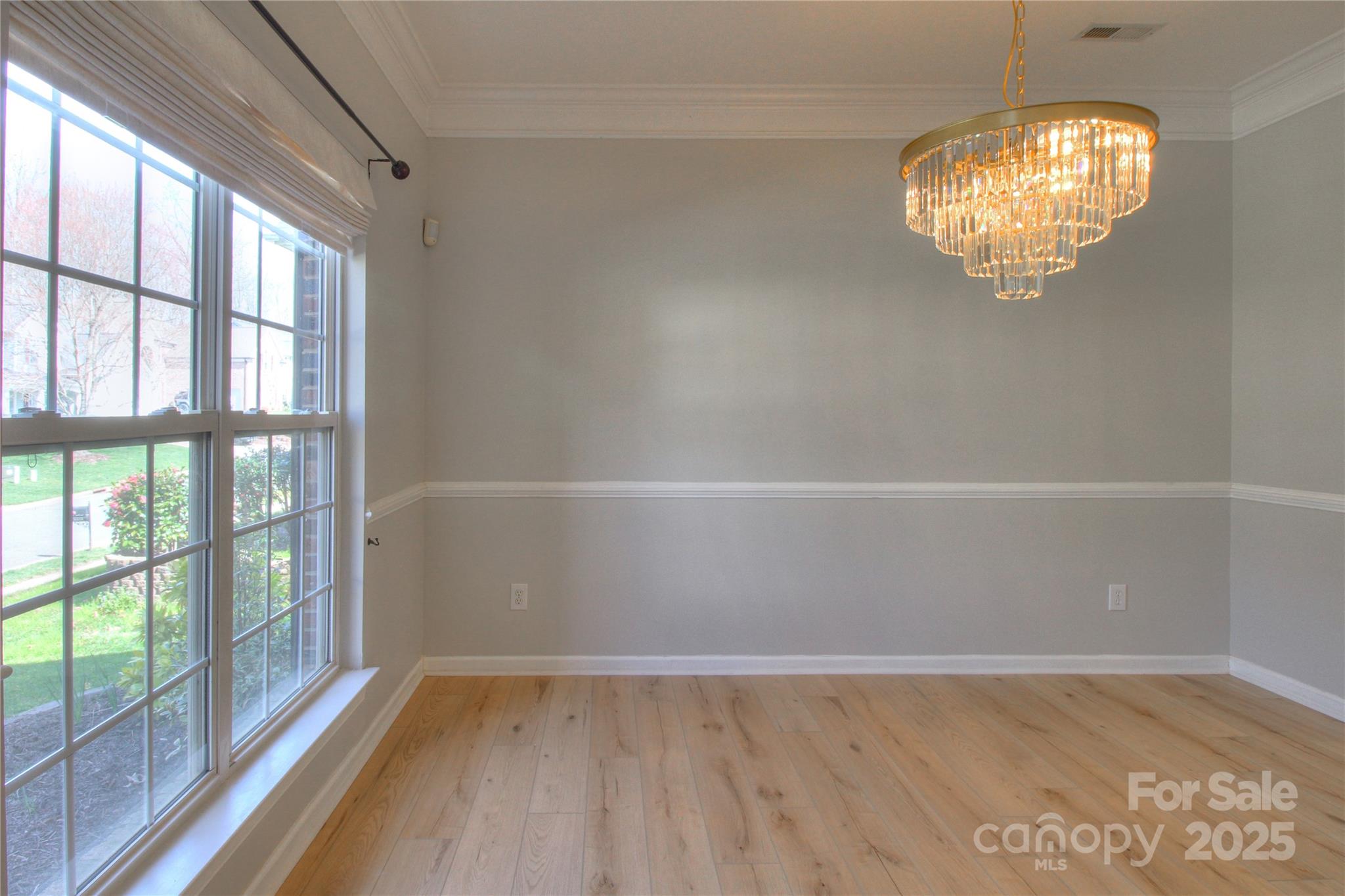 8414 Bampton Drive Concord, NC 28027 - Photo 10 of 32 a view of an empty room and window