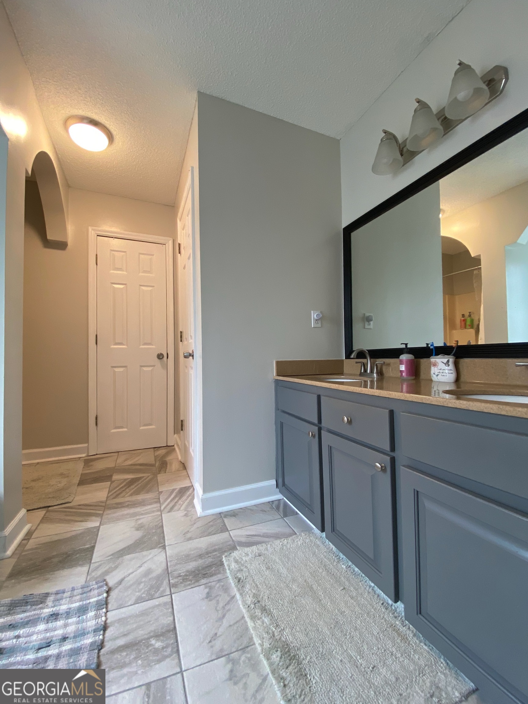 103 Fawn Court Byron, GA 31008 - Photo 13 of 23 a bathroom with a sink and a mirror