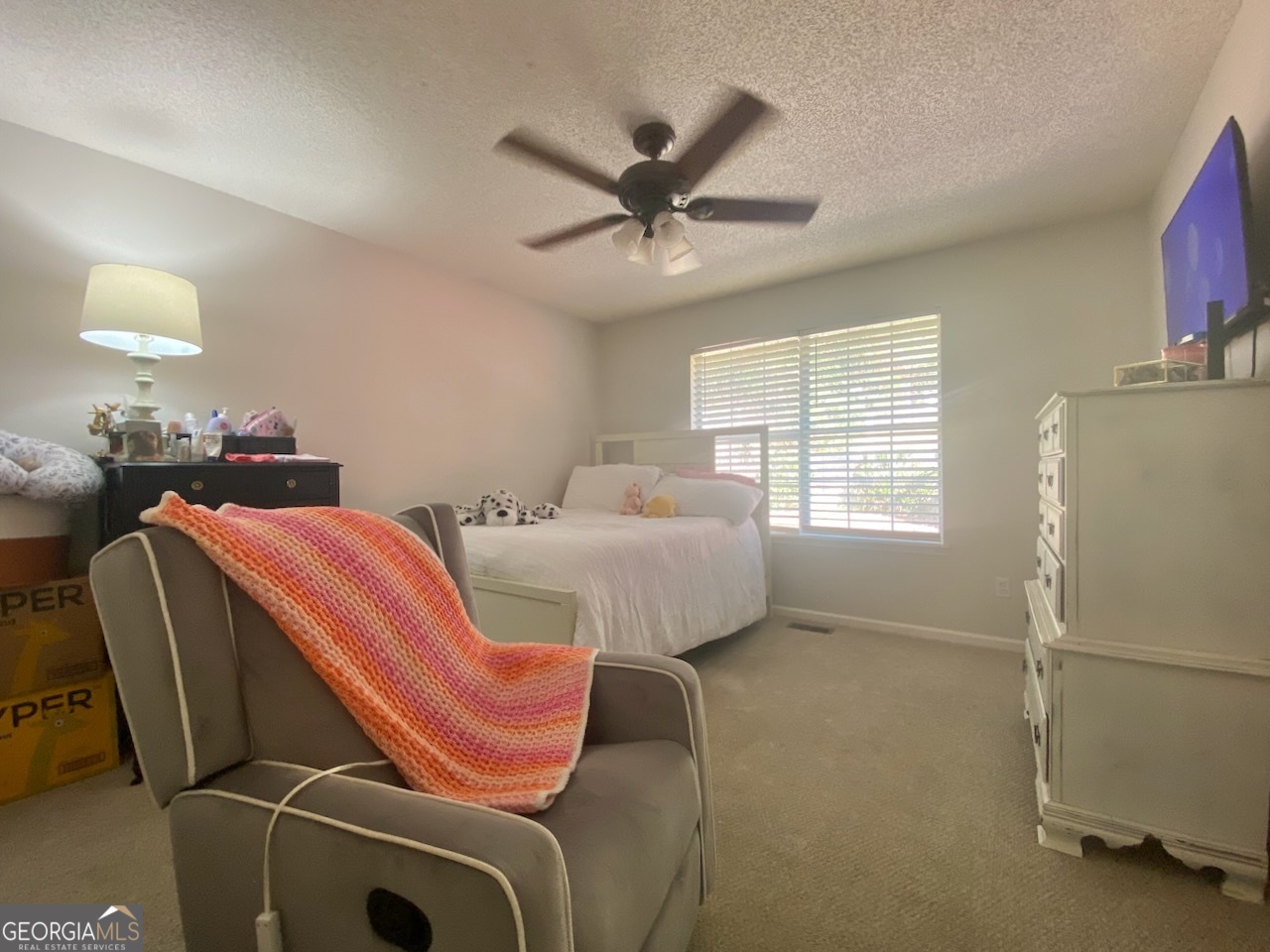 103 Fawn Court Byron, GA 31008 - Photo 14 of 23 a bed room with a bed and a window