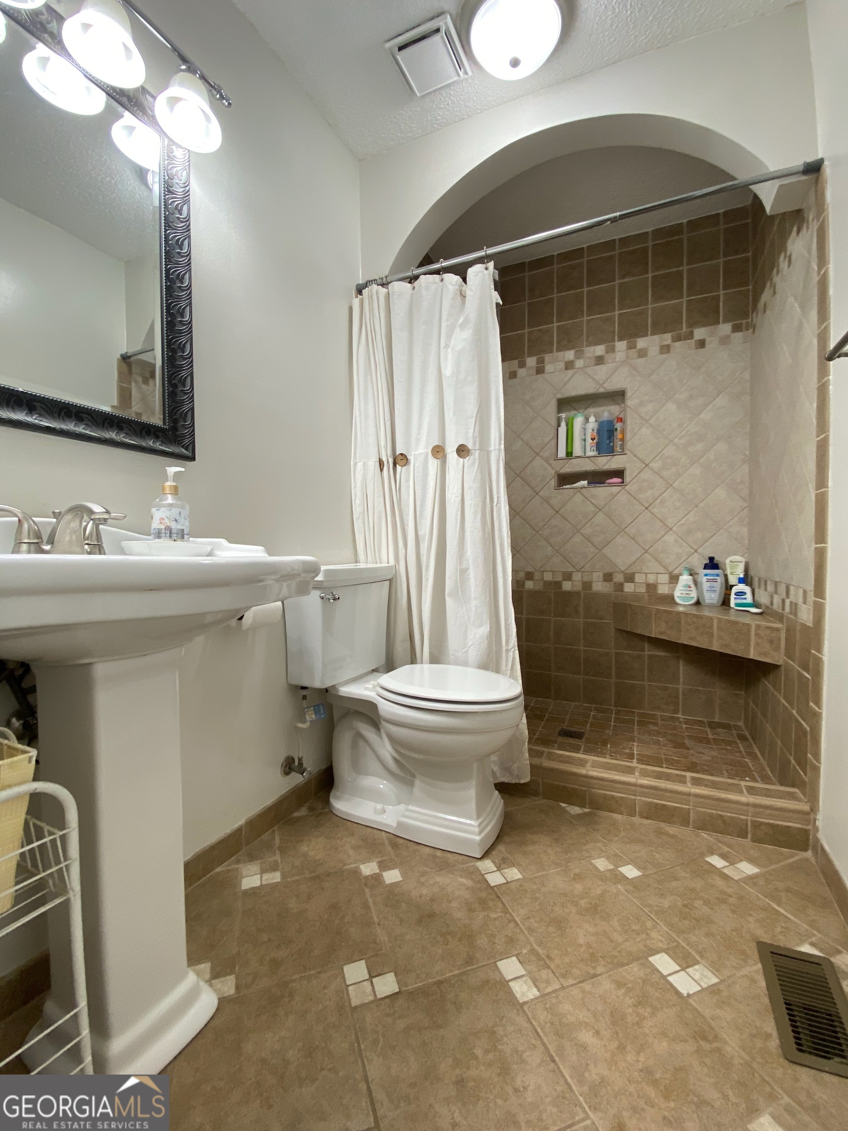 103 Fawn Court Byron, GA 31008 - Photo 15 of 23 a bathroom with a sink toilet and shower