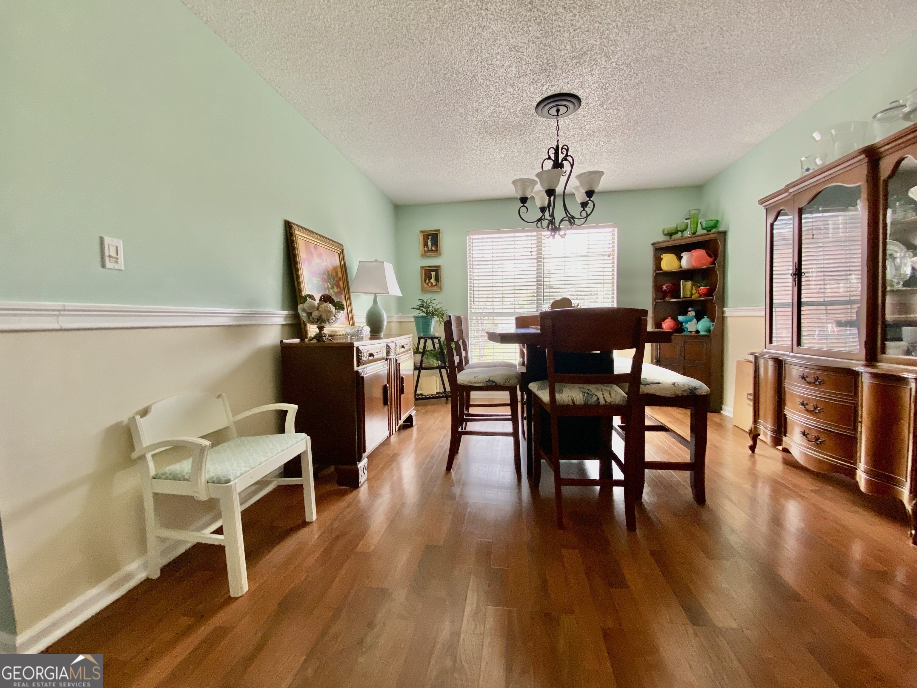 103 Fawn Court Byron, GA 31008 - Photo 5 of 23 a view of a dining room with furniture wooden floor and chandelier