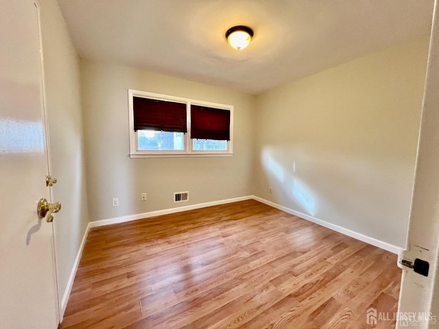 340 Old Post Road Edison, NJ 08817 - Photo 12 of 23 a view of a room with wooden floor and small space