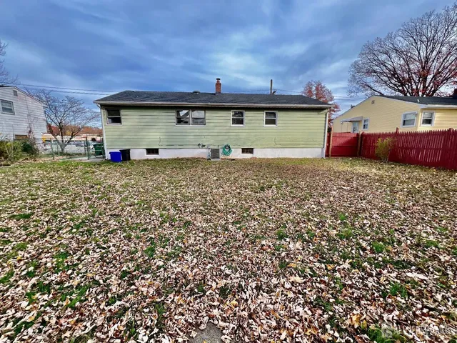 a view of a back yard of the house