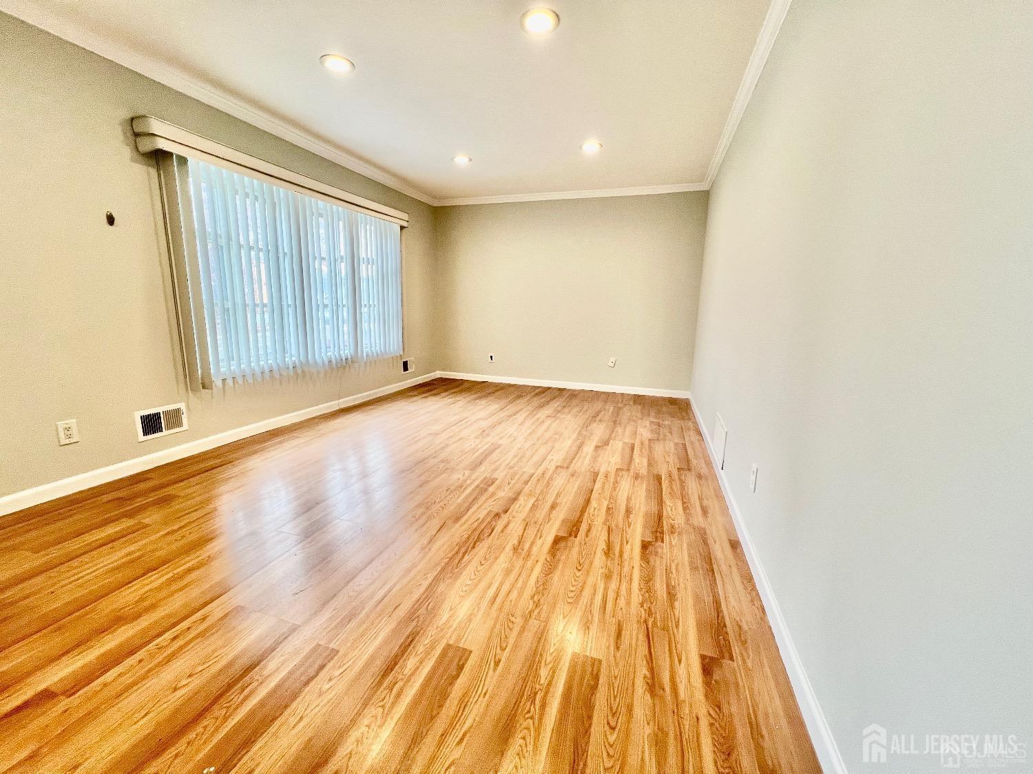340 Old Post Road Edison, NJ 08817 - Photo 5 of 23 a view of a room with wooden floor and brick walls