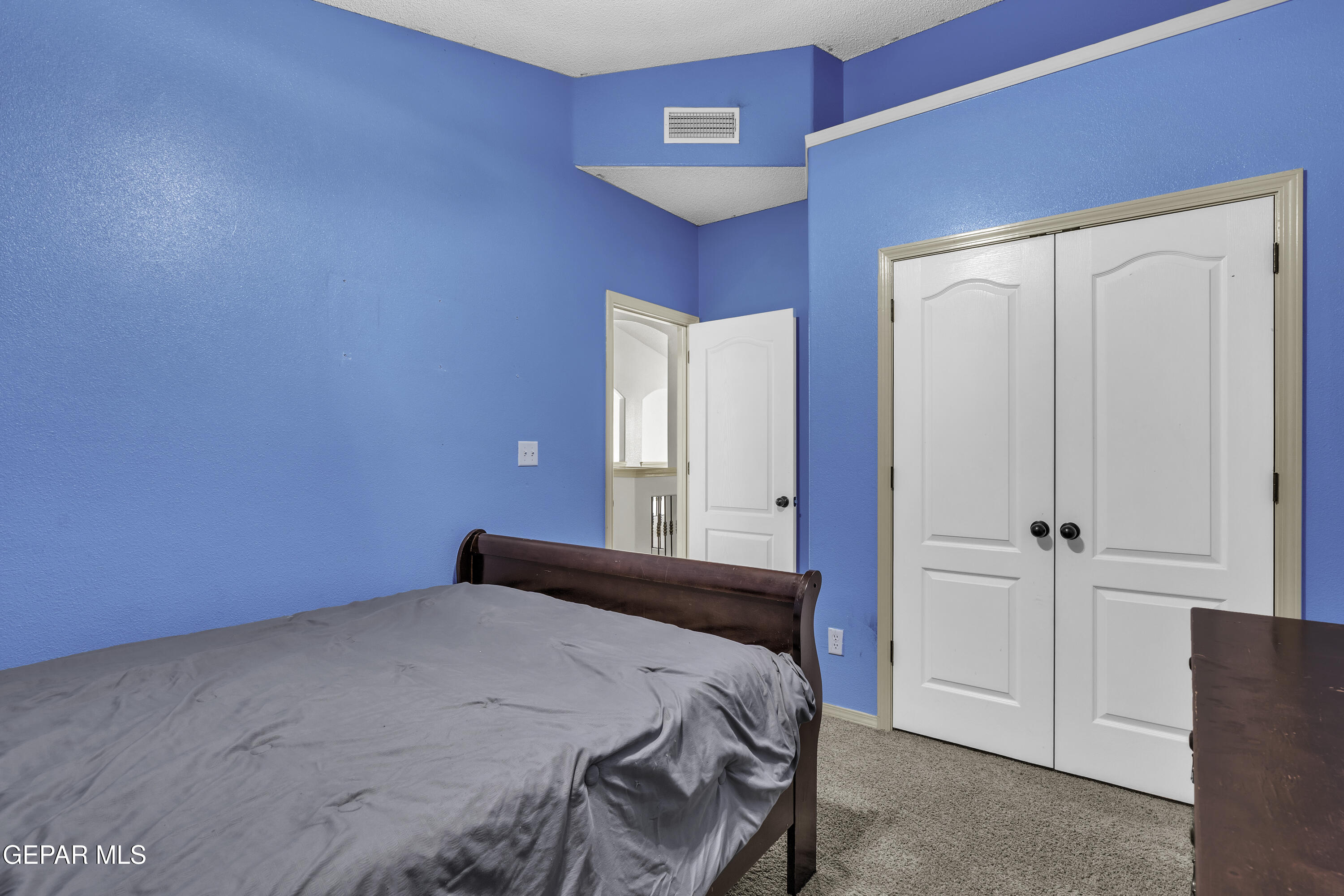 14401 Delta Point Court El Paso, TX 79938 - Photo 12 of 49 a bedroom with a bed and a lamp