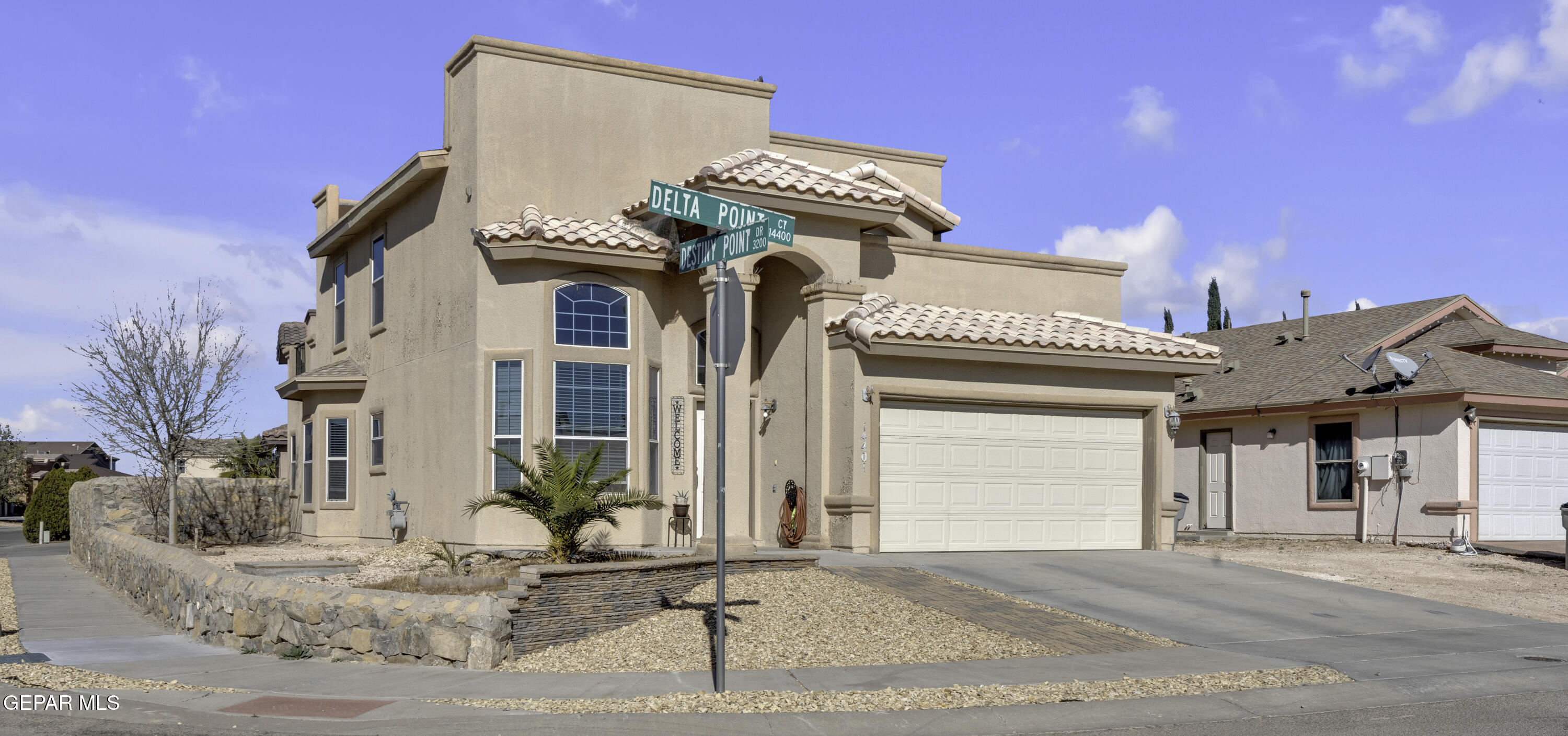 14401 Delta Point Court El Paso, TX 79938 - Photo 2 of 49 a front view of a house with garden