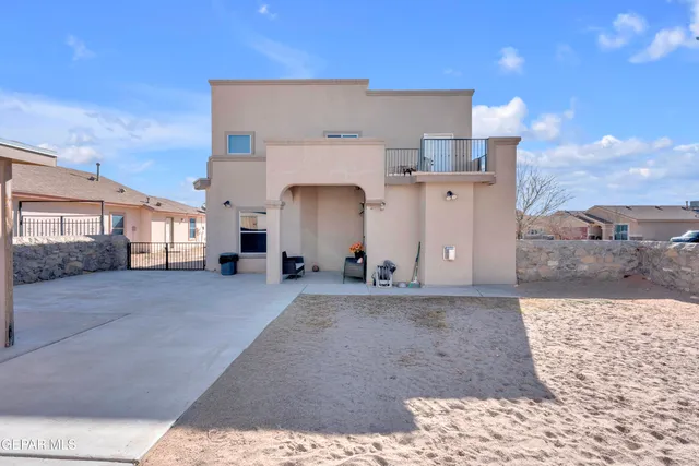a view of a house with a road