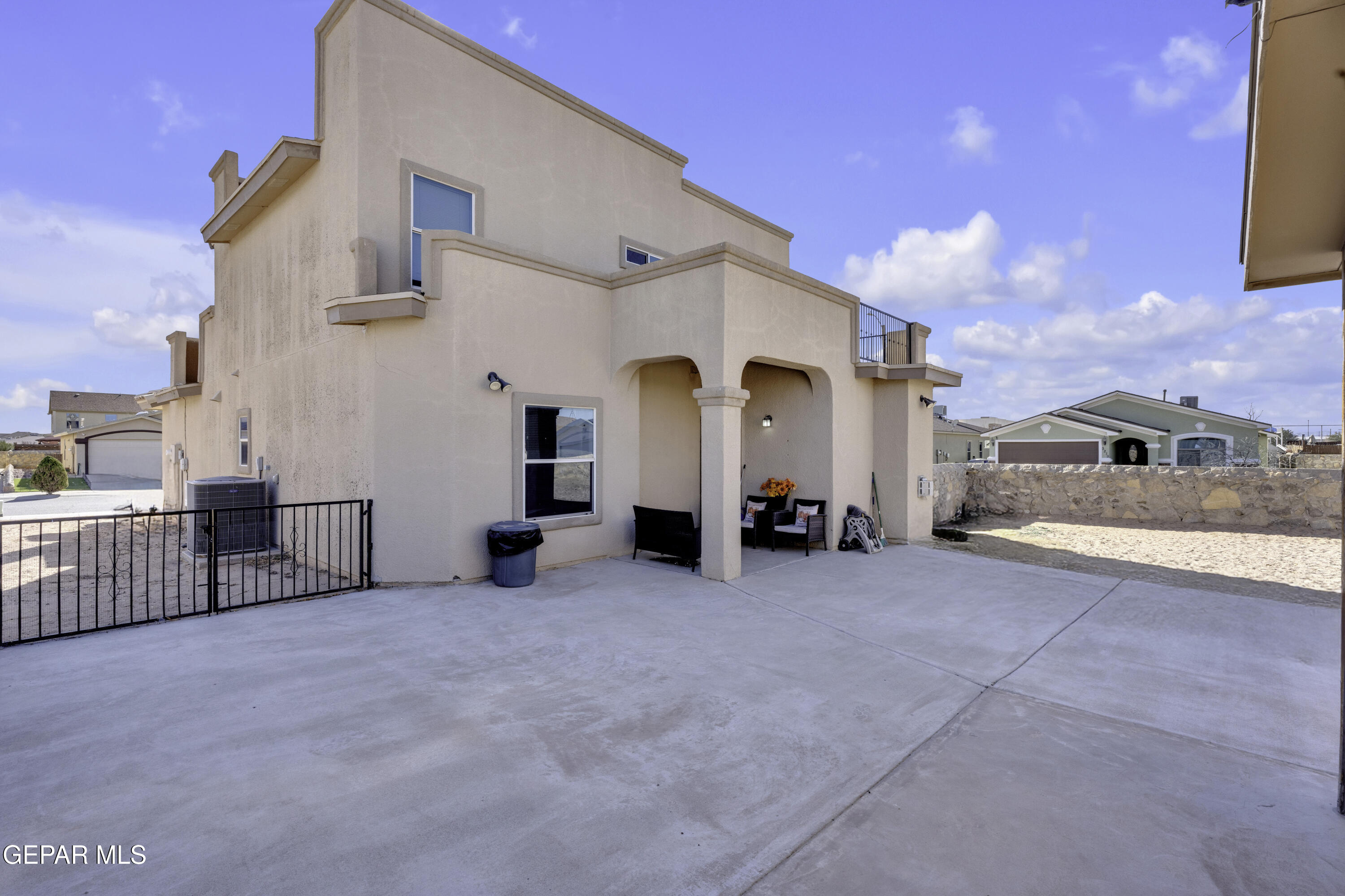 14401 Delta Point Court El Paso, TX 79938 - Photo 24 of 49 a view of a house with backyard and porch
