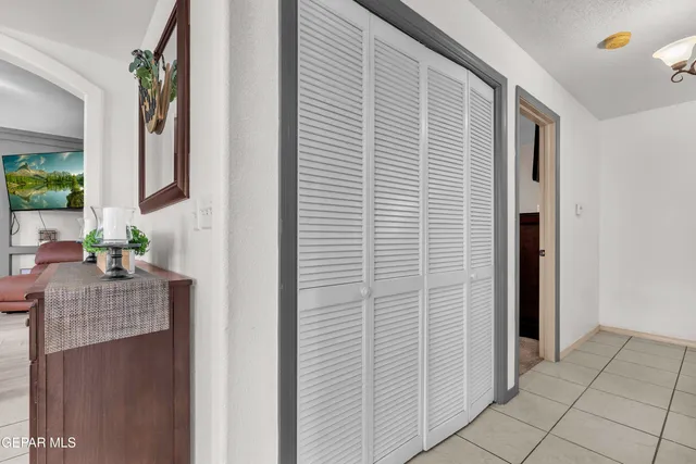 a view of livingroom with furniture and floor to ceiling window