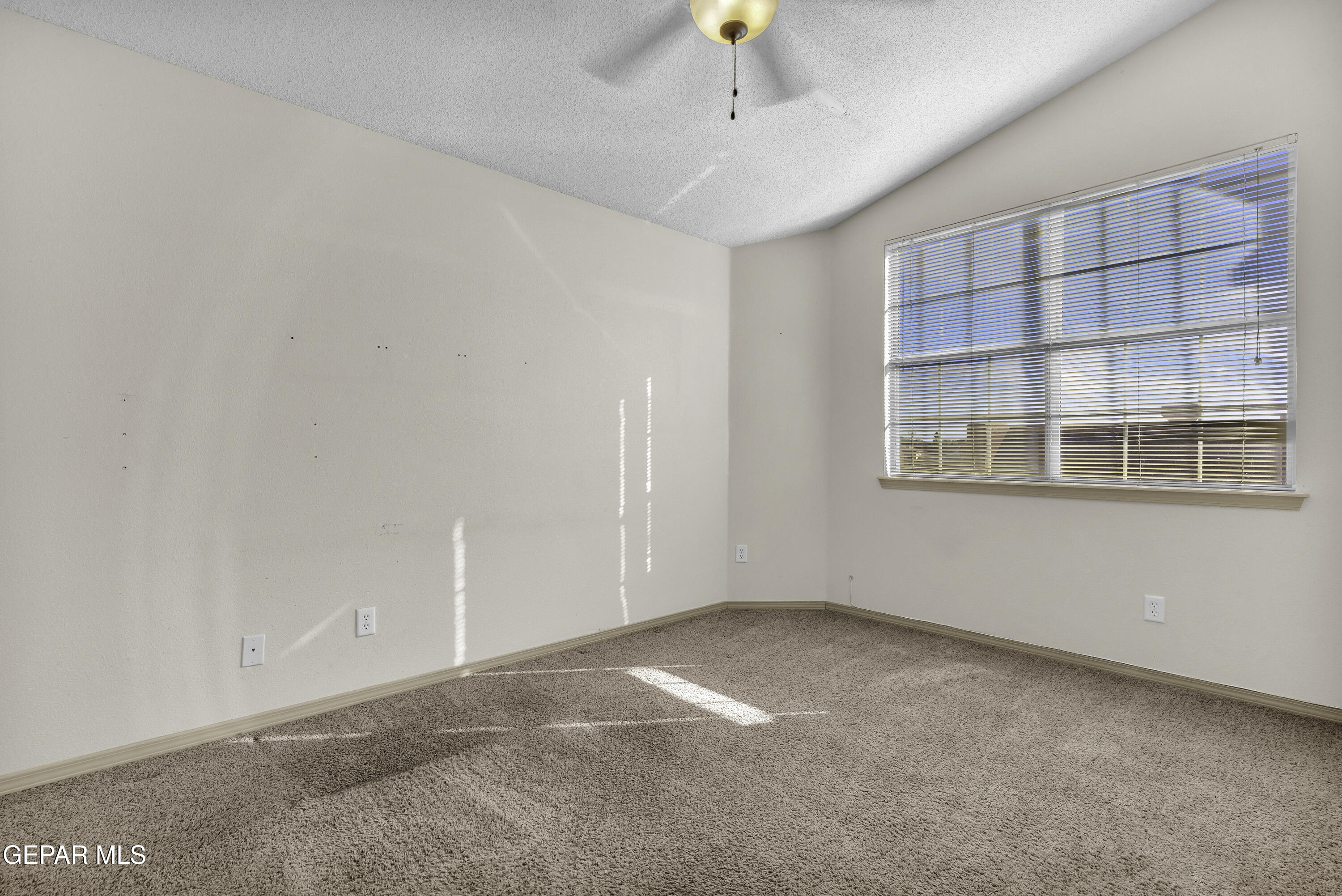 14401 Delta Point Court El Paso, TX 79938 - Photo 27 of 49 a view of an empty room with a window