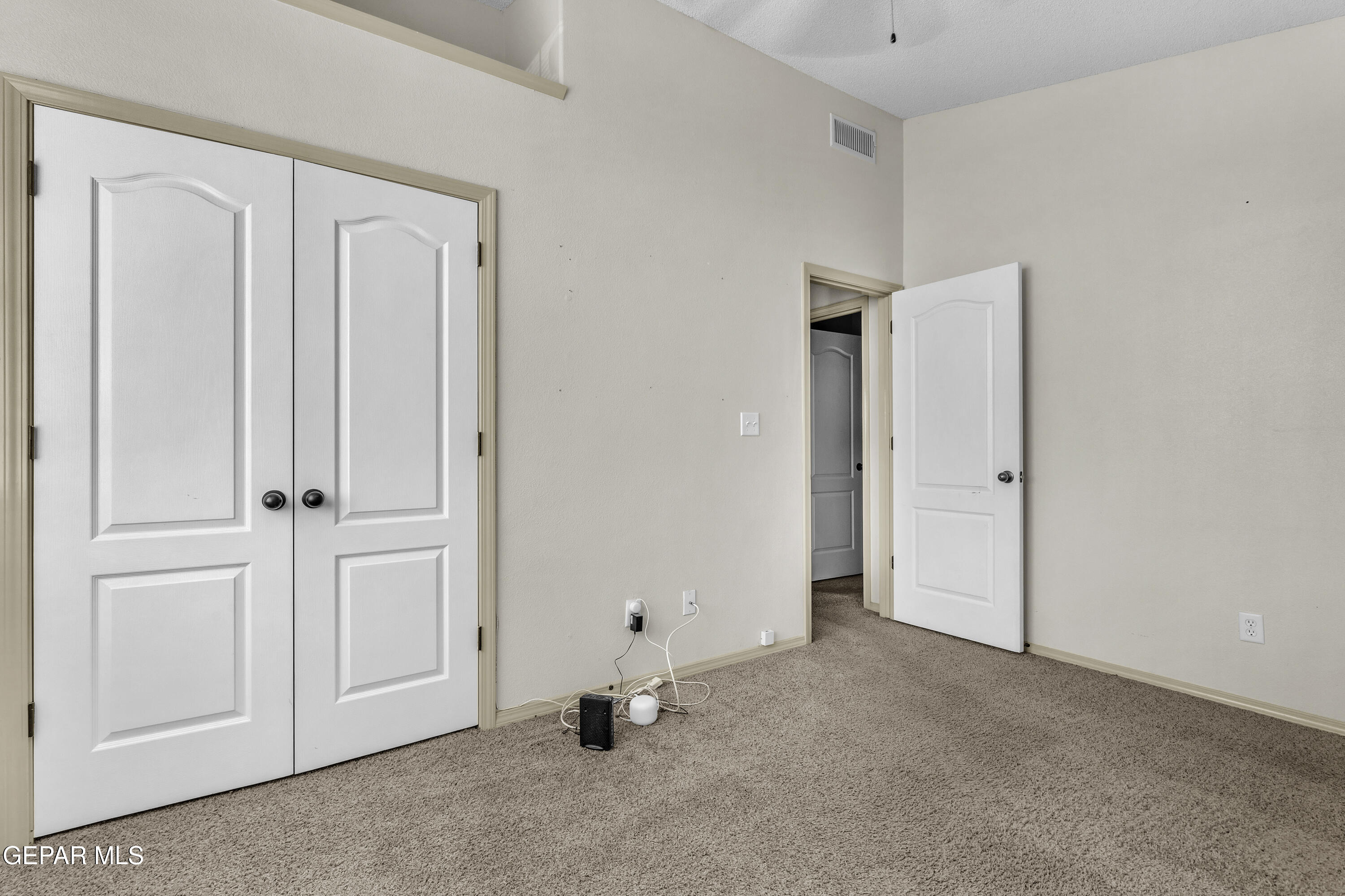 14401 Delta Point Court El Paso, TX 79938 - Photo 28 of 49 an empty room with windows