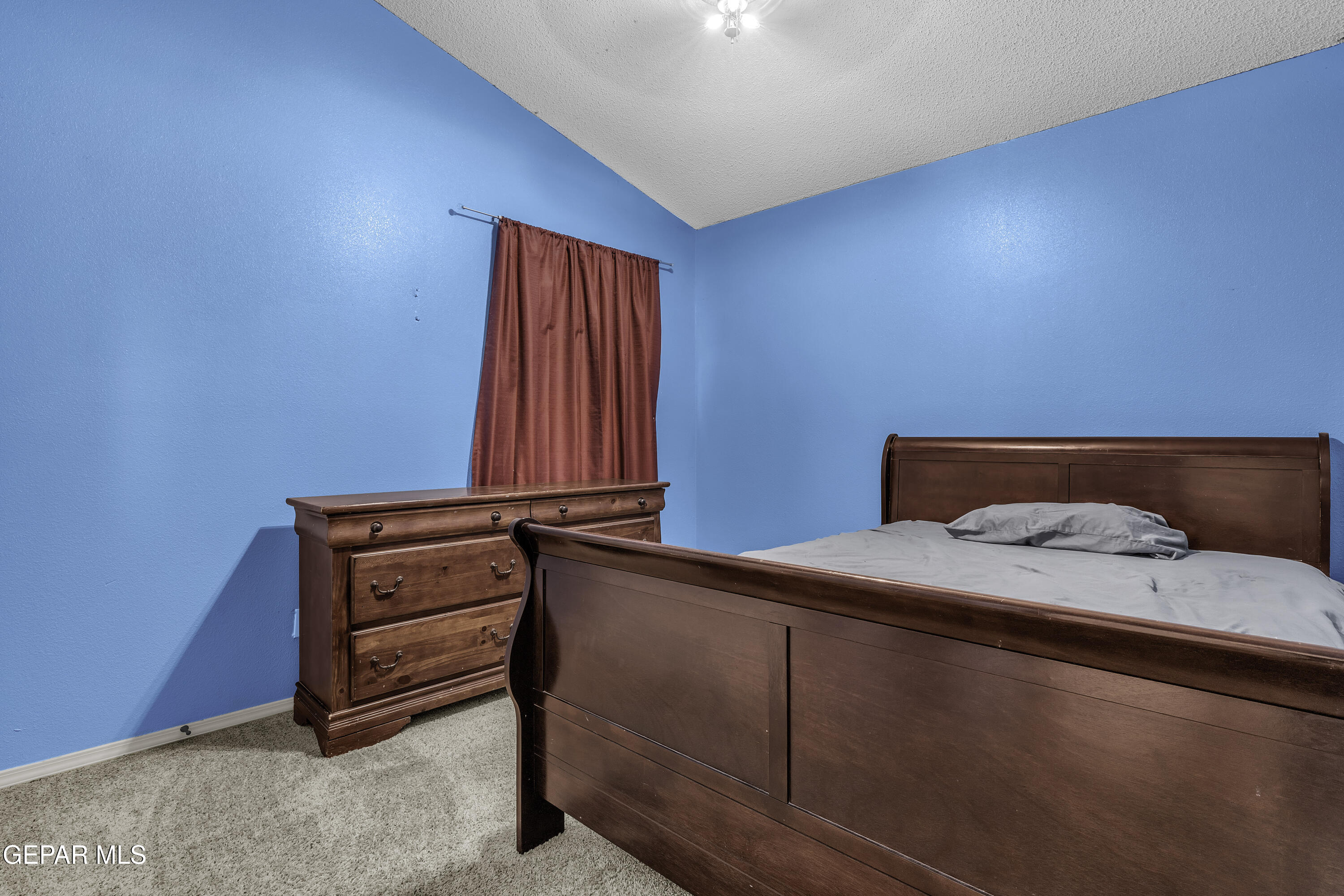 14401 Delta Point Court El Paso, TX 79938 - Photo 29 of 49 a room with furniture and window