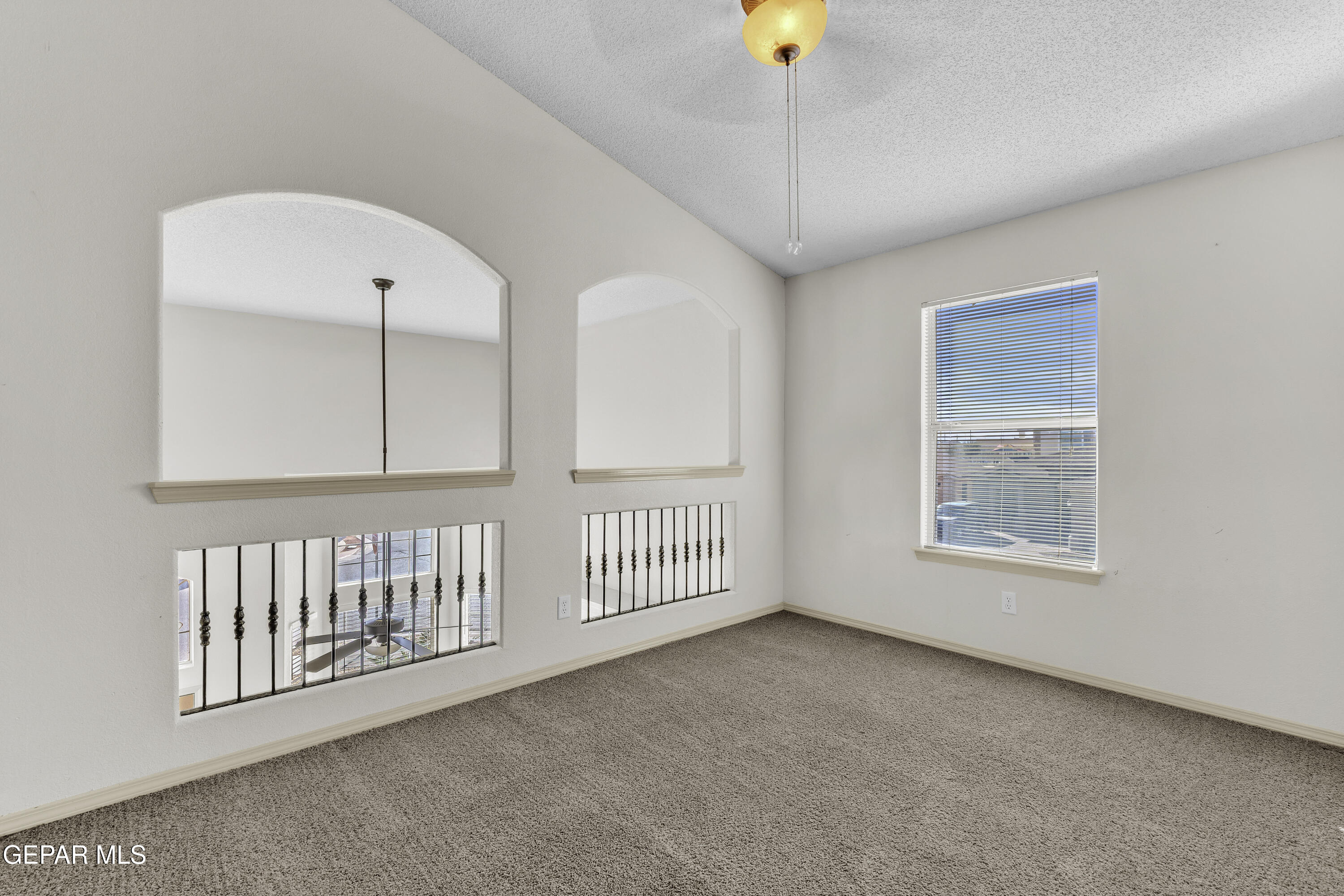 14401 Delta Point Court El Paso, TX 79938 - Photo 31 of 49 a view of an empty room with a window