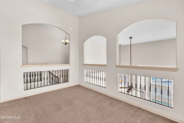 a view of a hallway with closet and entryway