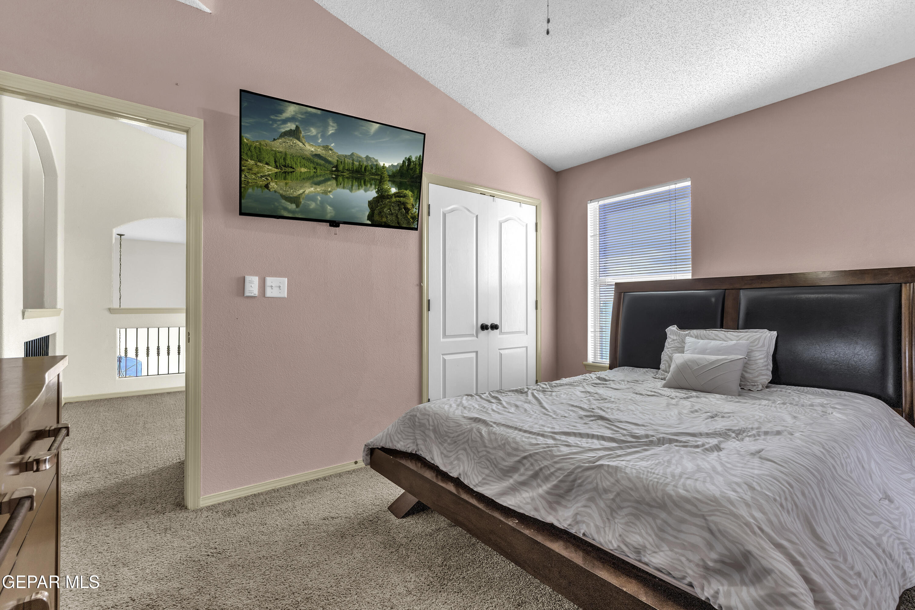 14401 Delta Point Court El Paso, TX 79938 - Photo 35 of 49 a bedroom with a bed and a painting on the wall