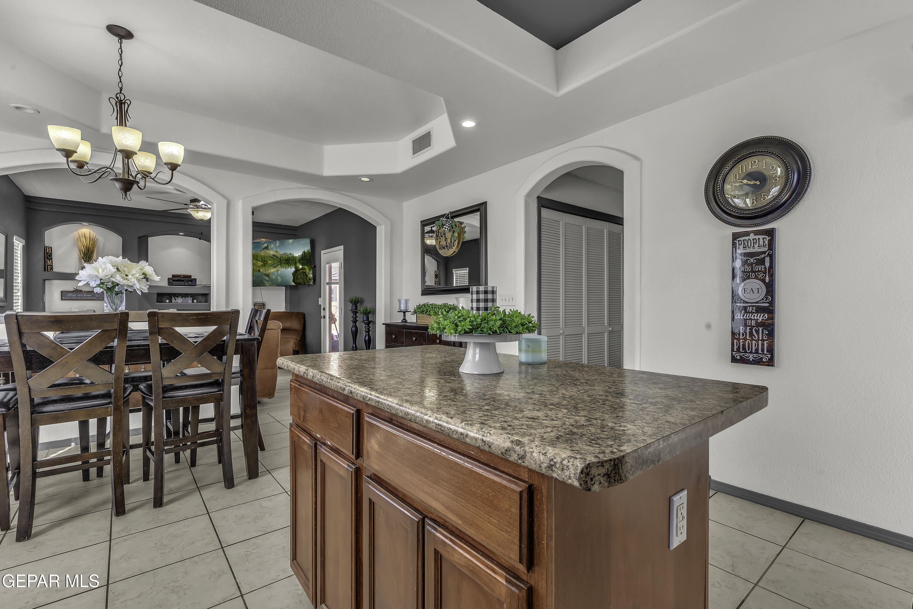 14401 Delta Point Court El Paso, TX 79938 - Photo 40 of 49 a view of a table and chairs in a kitchen