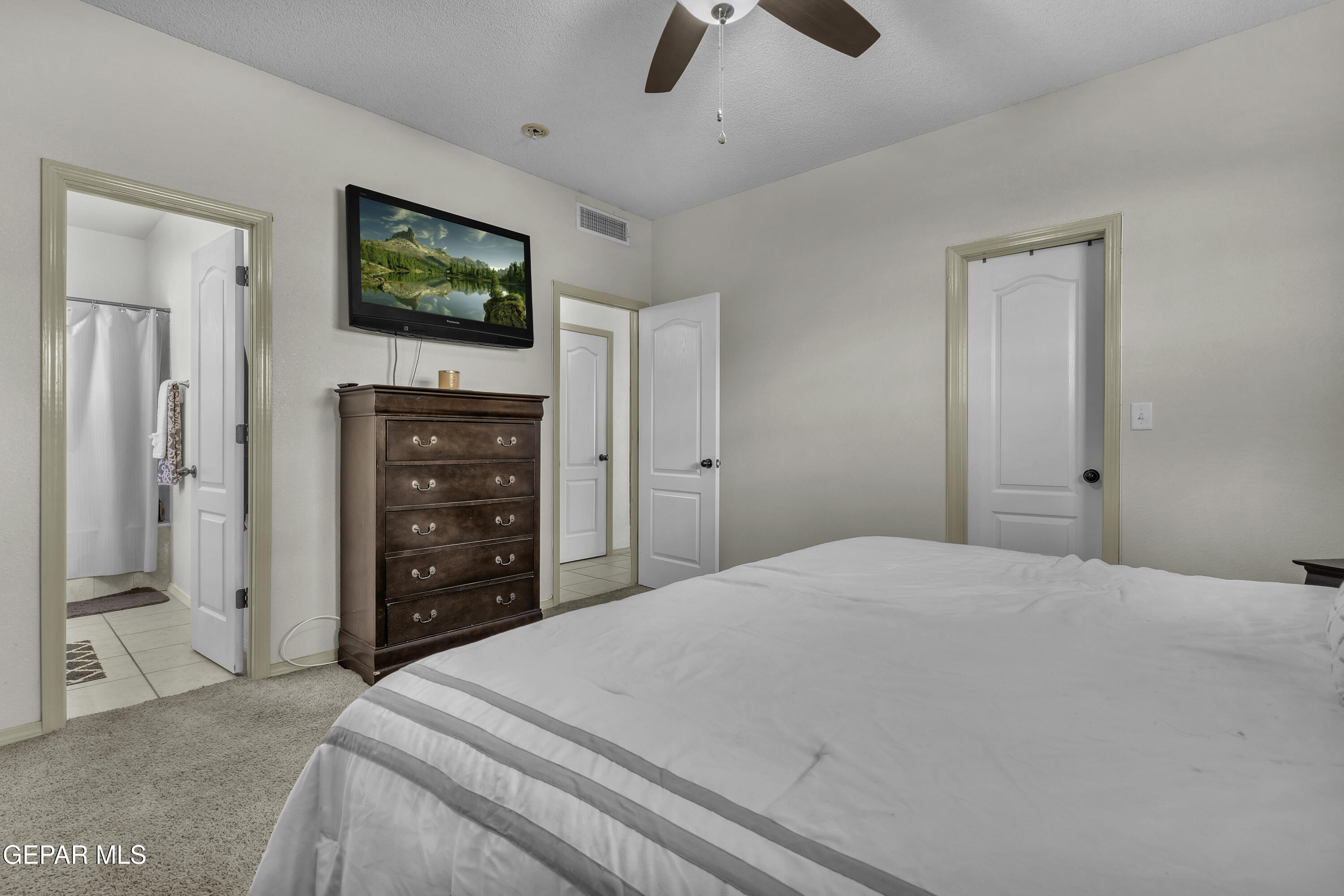 14401 Delta Point Court El Paso, TX 79938 - Photo 44 of 49 a bedroom with a bed and a flat screen tv