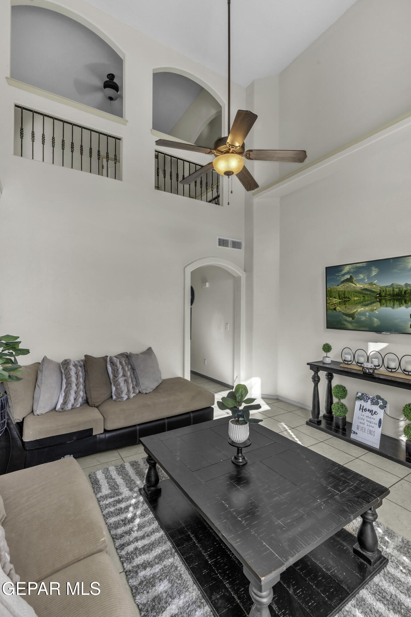 14401 Delta Point Court El Paso, TX 79938 - Photo 47 of 49 a living room with furniture and flat screen tv