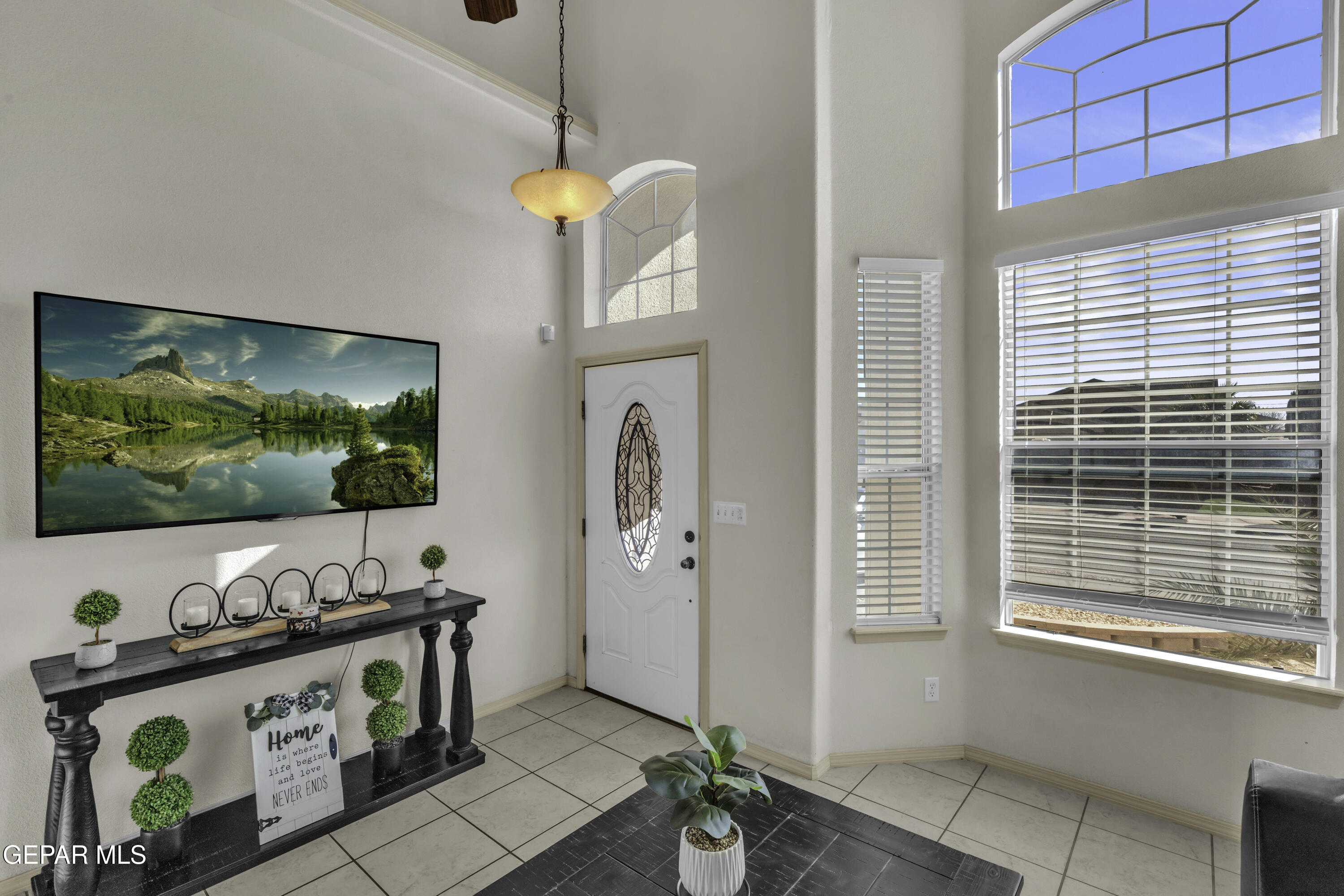 14401 Delta Point Court El Paso, TX 79938 - Photo 5 of 49 a living room with furniture and a flat screen tv
