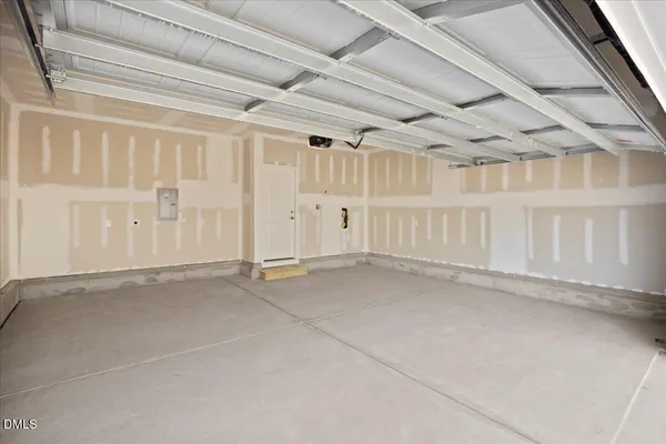 a kitchen with a refrigerator and a microwave