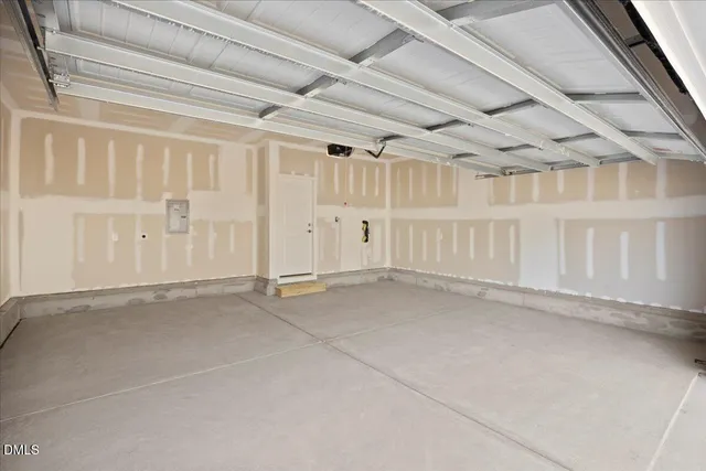 a kitchen with a refrigerator and a microwave