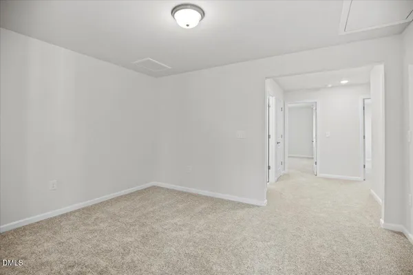 a bathroom with a shower and a toilet
