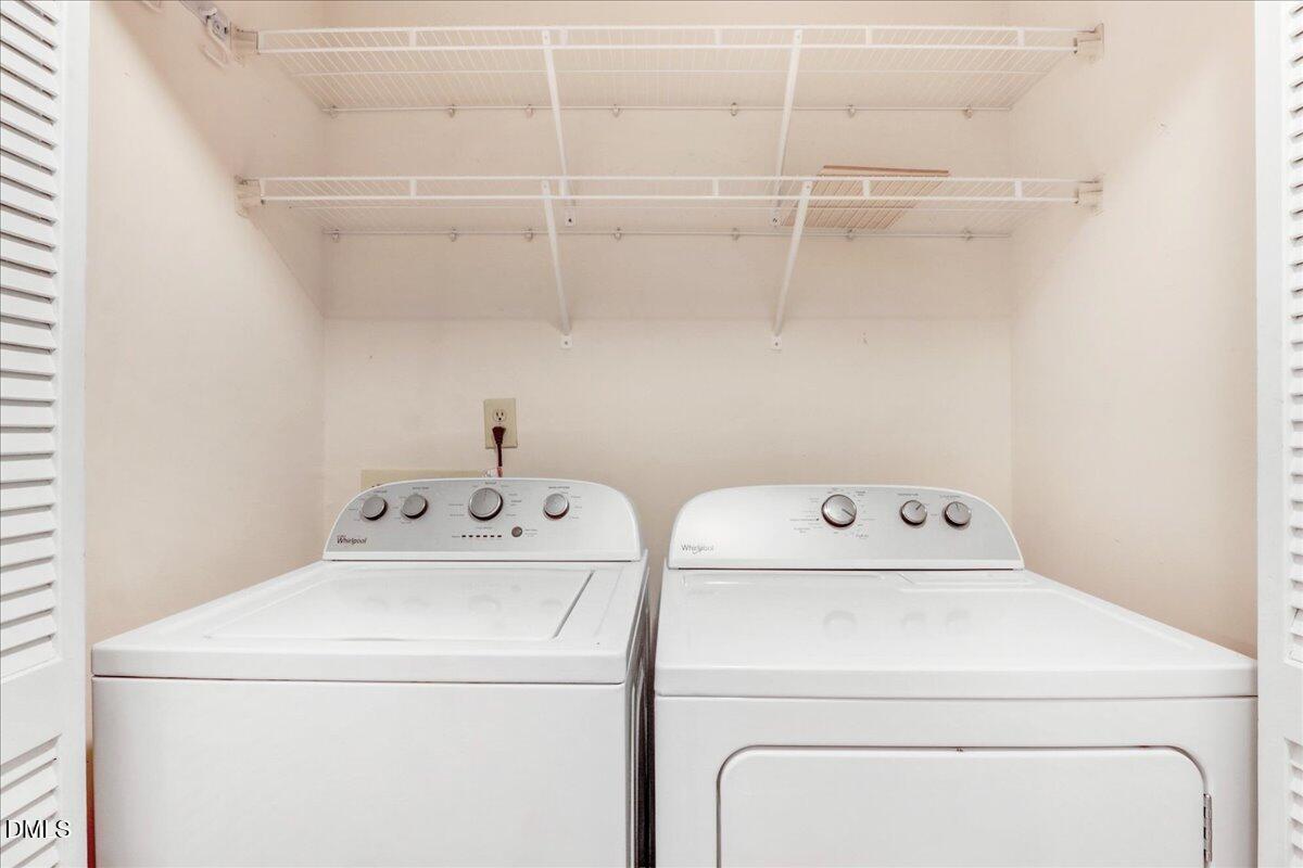 5738 3 Oaks Drive Raleigh, NC 27612 - Photo 22 of 32 a utility room with dryer and washer