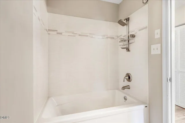 a bathroom with a double vanity sink and mirror