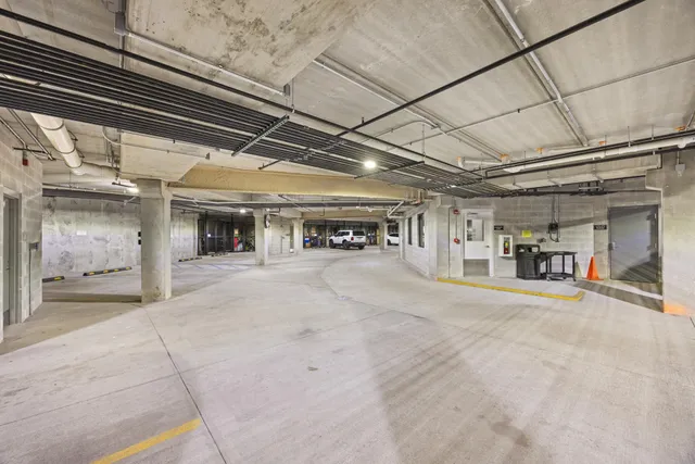 a view of a building with sitting area