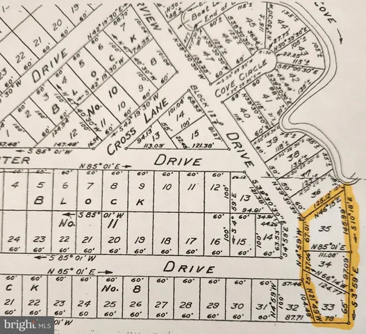 a sign on a wall next to a wall